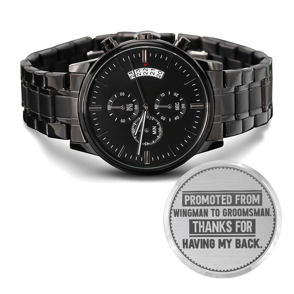 Black metal watch with a round face and a silver disc engraved Promoted From Wingman to Groomsman. Thanks For Having My Back.